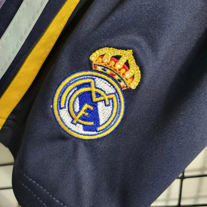 MAILLOT ENFANT REAL MADRID EXTÉRIEUR 2023/2024 Onze Maillots